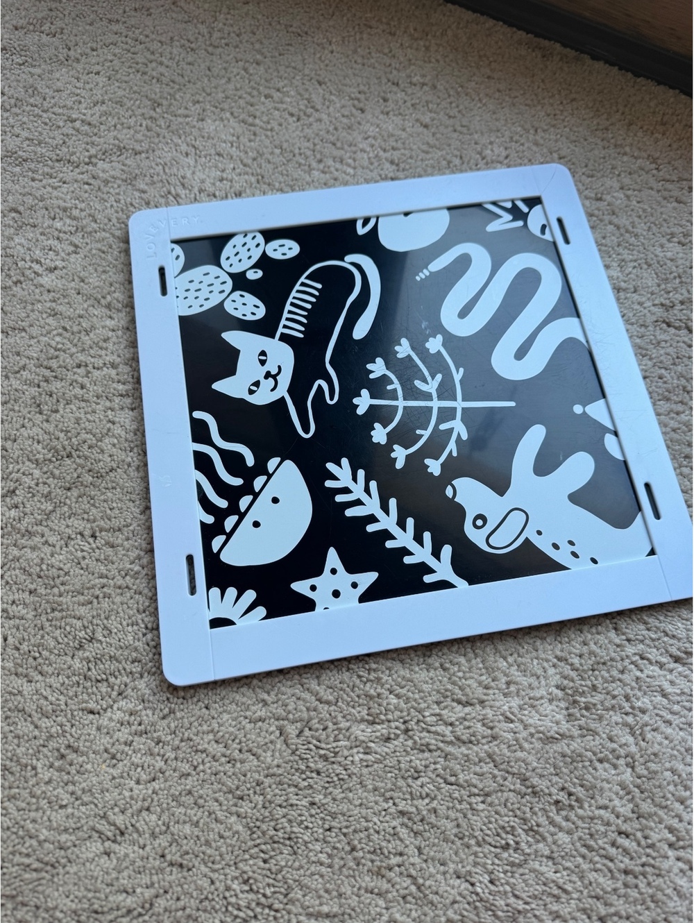 Lovevery mirror with black and white images